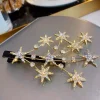 HORQUILLAS ESTRELLAS CRISTALES GOLD