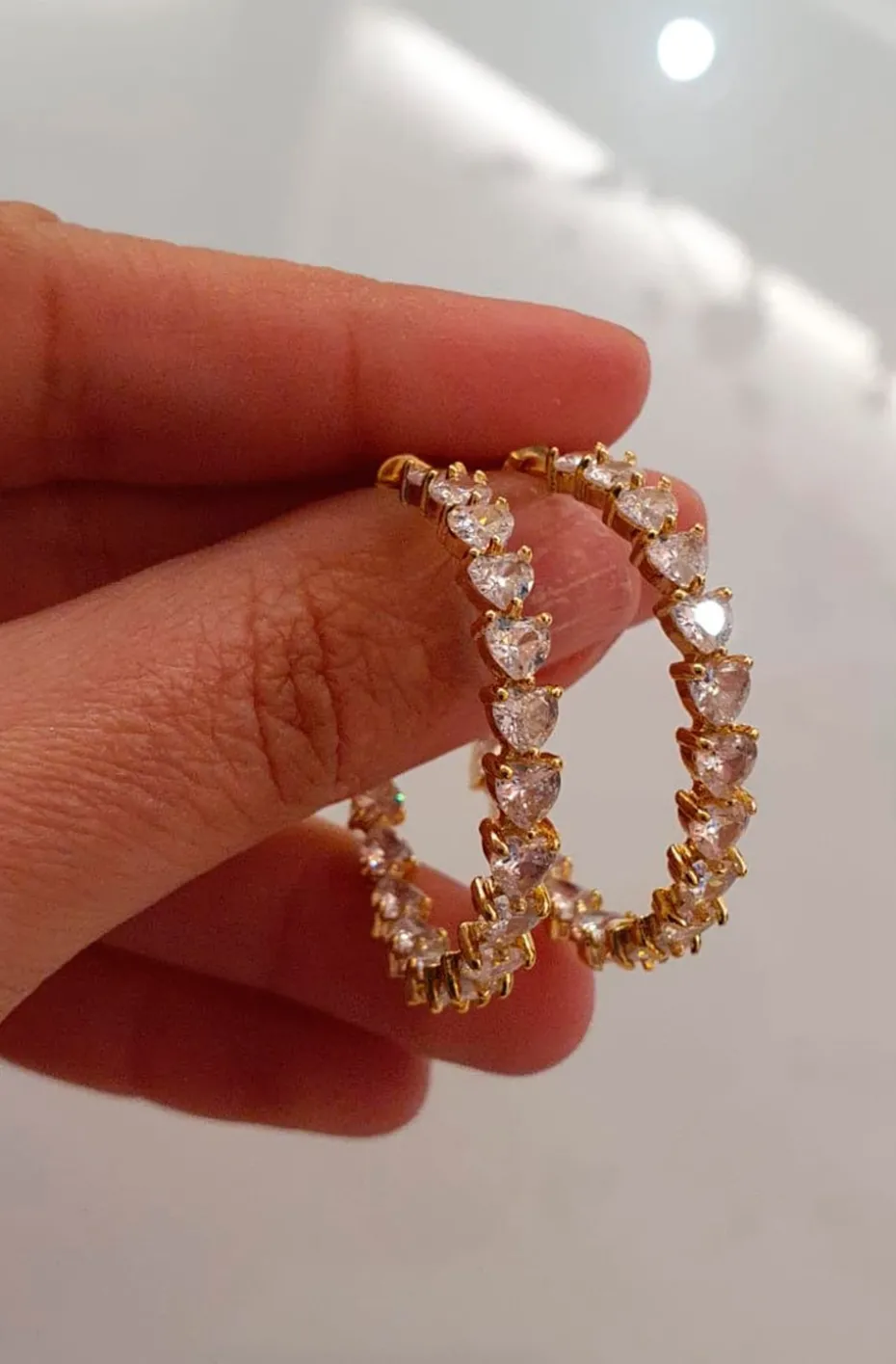 PENDIENTES ARO CORAZONES DORADO