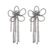 PENDIENTES FLOR CON TIRAS DE CRISTALES
