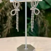 PENDIENTES LAZADAS CRISTALES PLATA