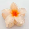 PINZA DEL PELO FLOR HAWAIANA CREMA PASTEL