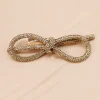 PINZA DEL PELO LAZADA CRISTALES DORADOS