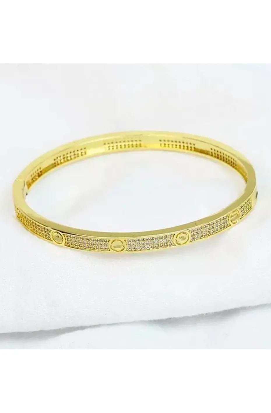 PULSERA CLAVOS CIRCONITAS DORADA