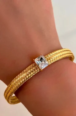 PULSERA DORADA DE ACERO CRISTAL CLEAR