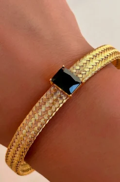 PULSERA DORADA DE ACERO CRISTAL NEGRO