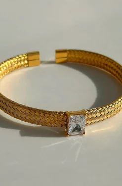 PULSERA DORADA DE ACERO CRISTAL CLEAR
