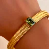 PULSERA DORADA DE ACERO VERDE