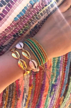 PULSERA O TOBILLERA COWRIE DORADA 24K
