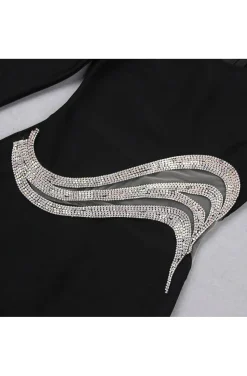 VESTIDO NEGRO DETALLE JOYA